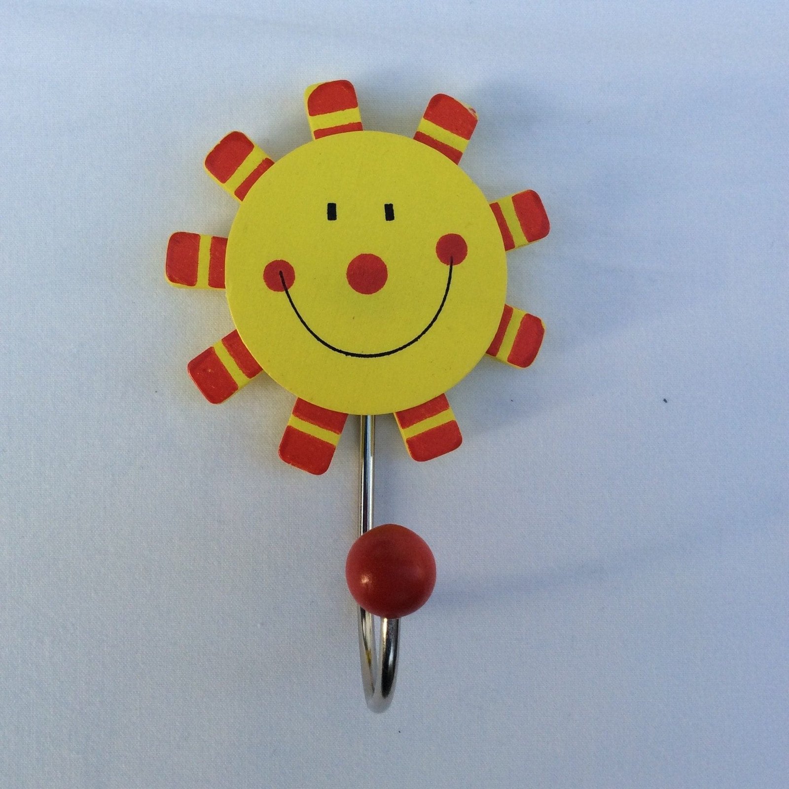 Image 1001 Patère soleil jaune dans le site N°1 de patère et porte-manteaux de france